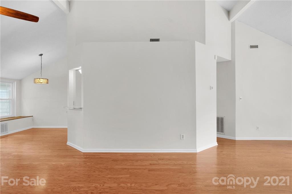 9838 Fairway Ridge Road, Unit 11 Charlotte, NC 28277 - Photo 12 of 40 a view of a room with wooden floor