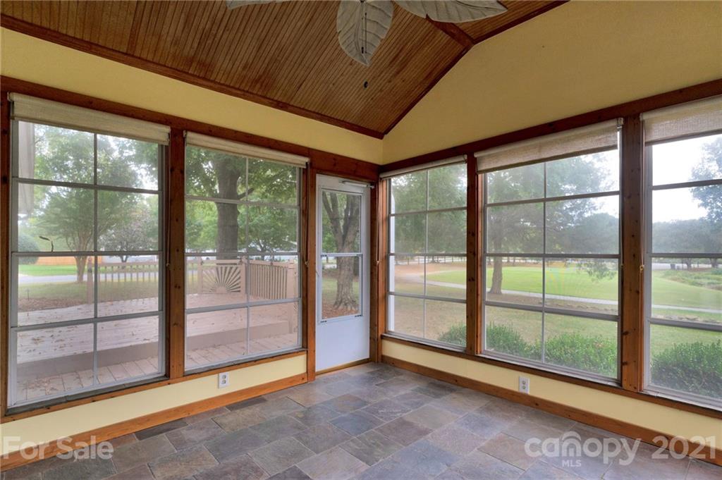 9838 Fairway Ridge Road, Unit 11 Charlotte, NC 28277 - Photo 31 of 40 a view of an empty room with windows