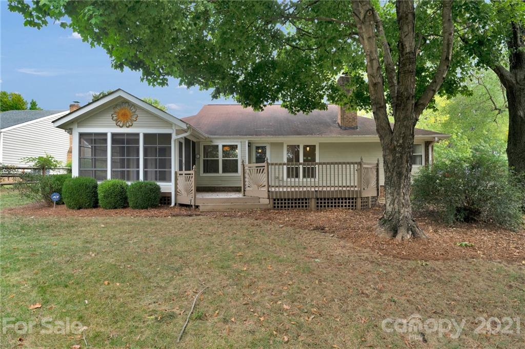 9838 Fairway Ridge Road, Unit 11 Charlotte, NC 28277 - Photo 36 of 40 a view of a house with a yard and large trees