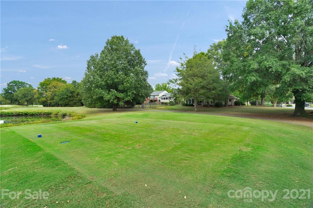 9838 Fairway Ridge Road, Unit 11 Charlotte, NC 28277 - Photo 39 of 40 a view of outdoor space with deck and yard