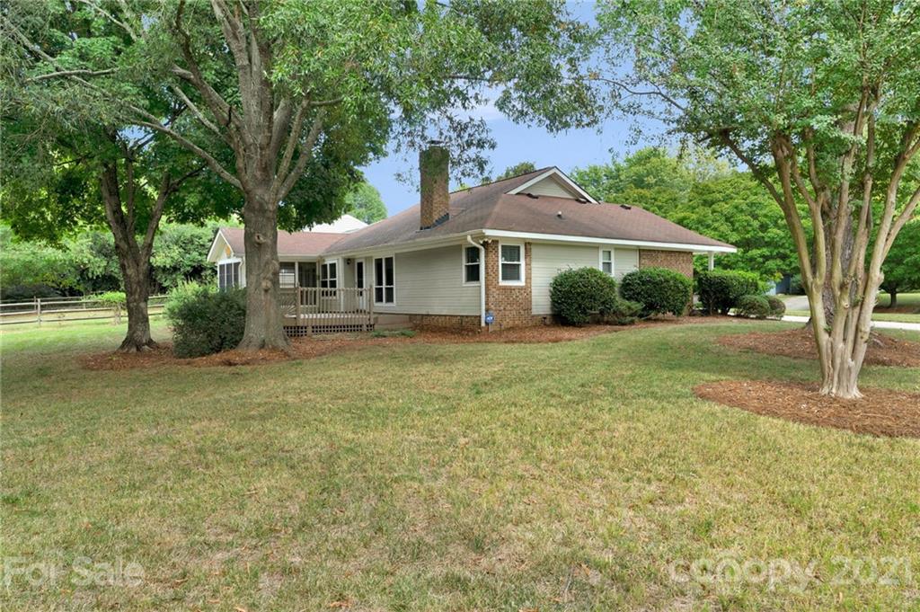 9838 Fairway Ridge Road, Unit 11 Charlotte, NC 28277 - Photo 40 of 40 a front view of a house with yard and green space