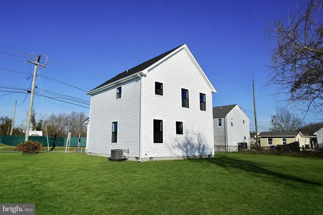 a view of a house with a big yard
