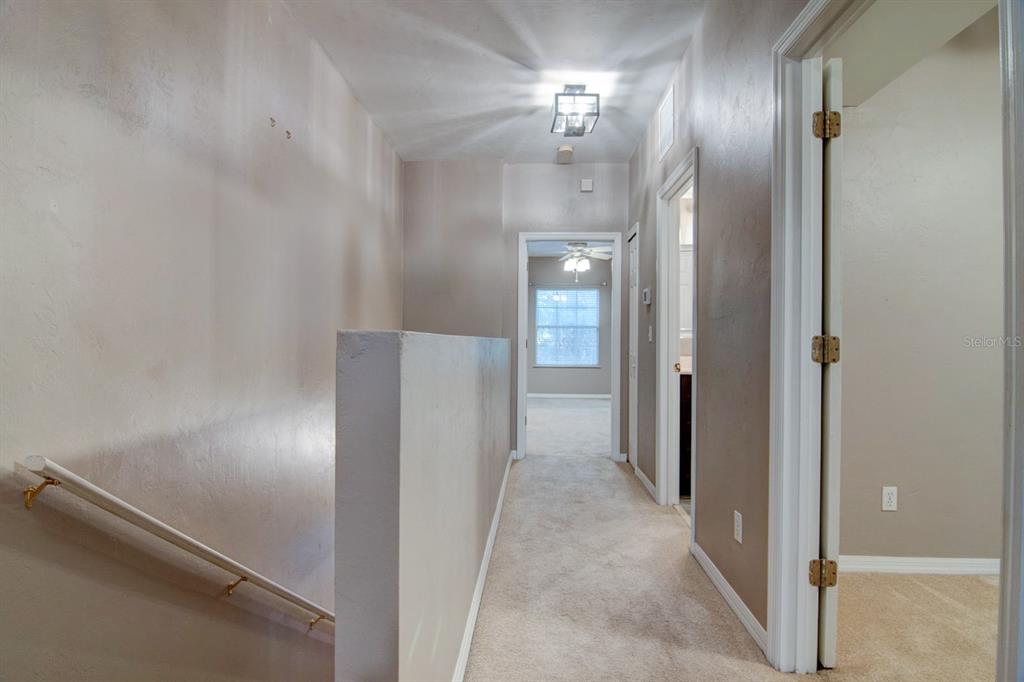 4933 Northwest 1st Place, Unit 110 Gainesville, FL 32607 - Photo 14 of 31 wooden floor in a gallery