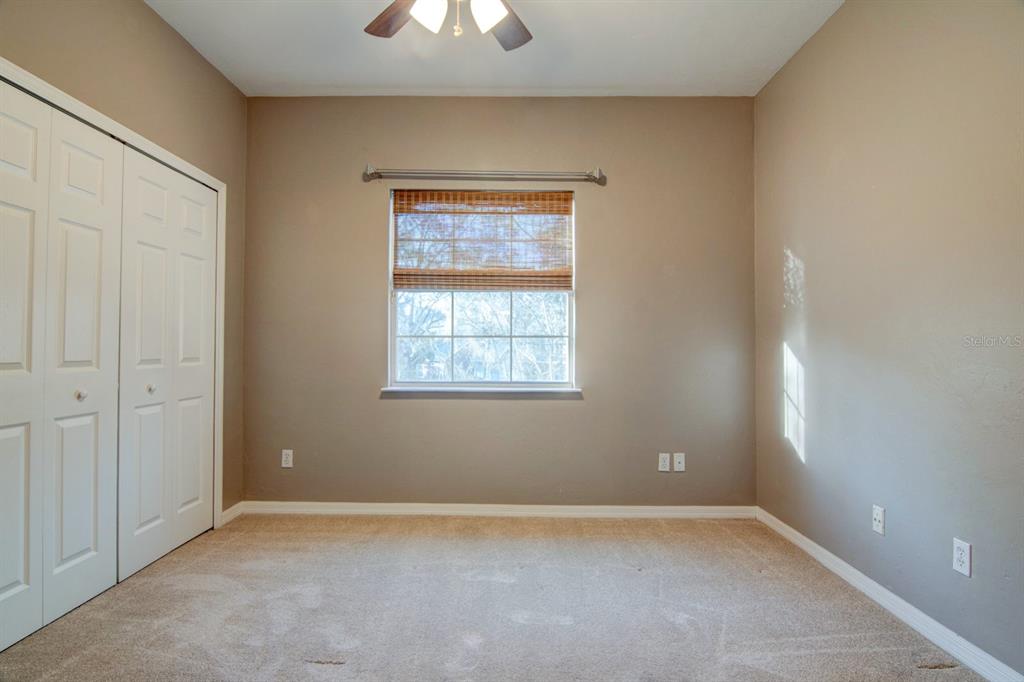 4933 Northwest 1st Place, Unit 110 Gainesville, FL 32607 - Photo 15 of 31 an empty room with a window