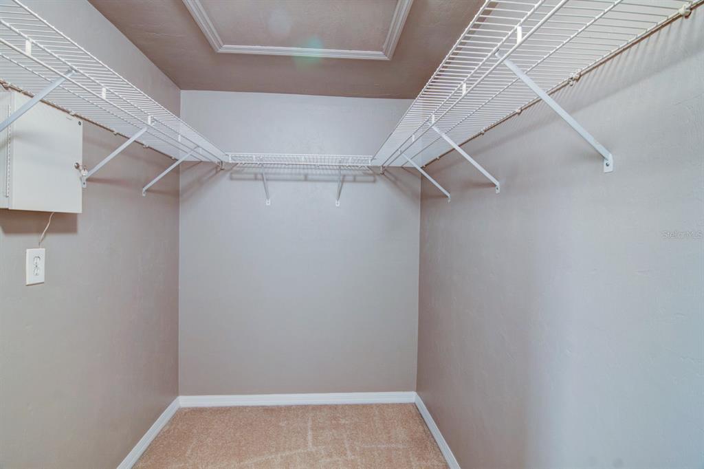 4933 Northwest 1st Place, Unit 110 Gainesville, FL 32607 - Photo 19 of 31 a view of an empty walk in closet