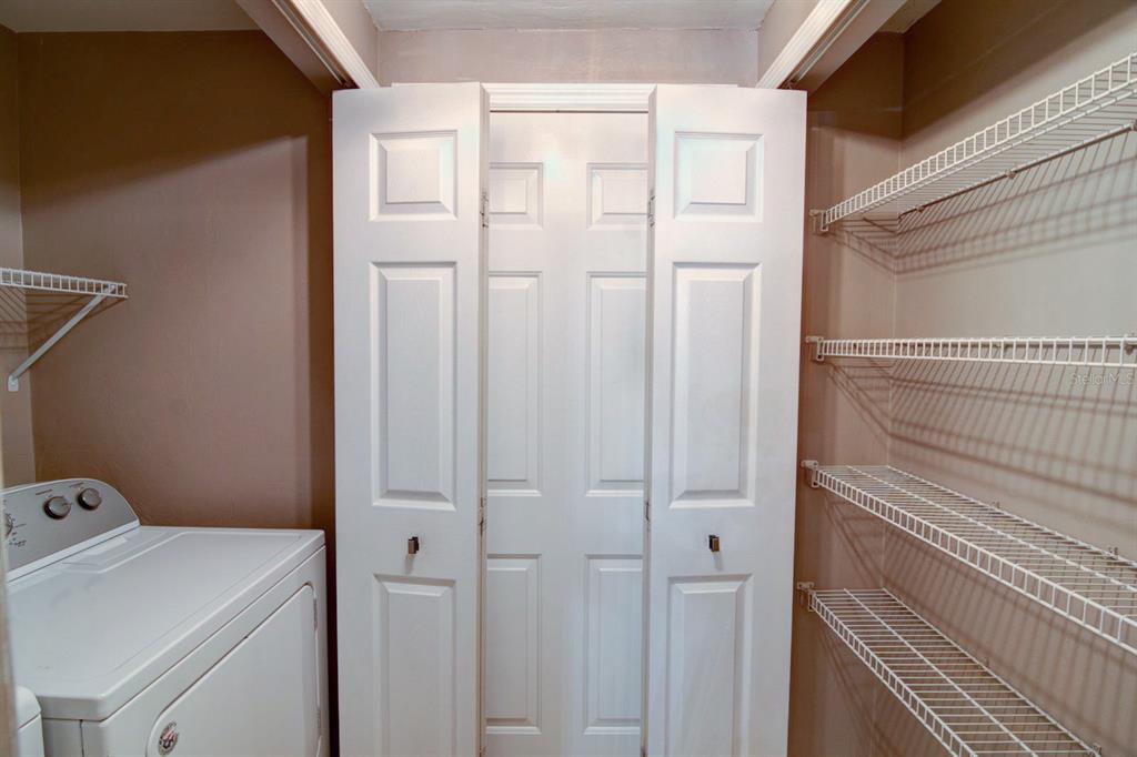 4933 Northwest 1st Place, Unit 110 Gainesville, FL 32607 - Photo 24 of 31 a bathroom with a sink and vanity