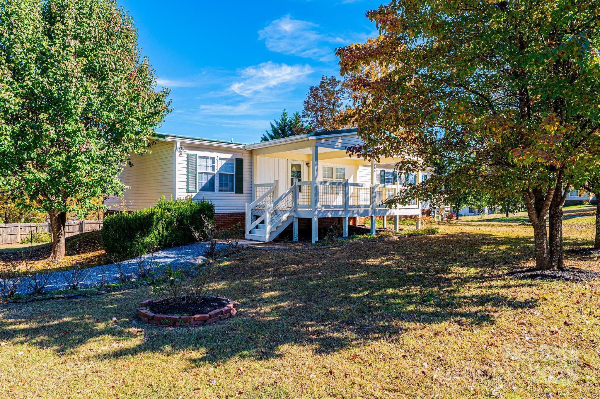 4086 Beckys Drive Lenoir, NC 28645 - Photo 1 of 23 front view of a house with a yard