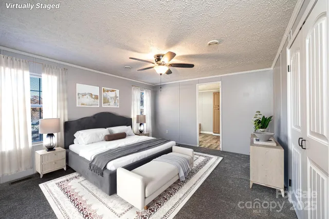 a view of a yard with wooden fence