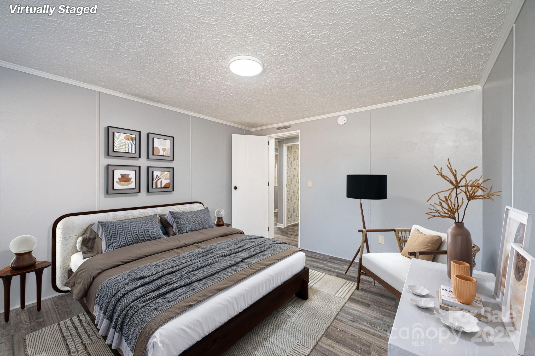 4086 Beckys Drive Lenoir, NC 28645 - Photo 14 of 23 a bedroom with a bed and a couch