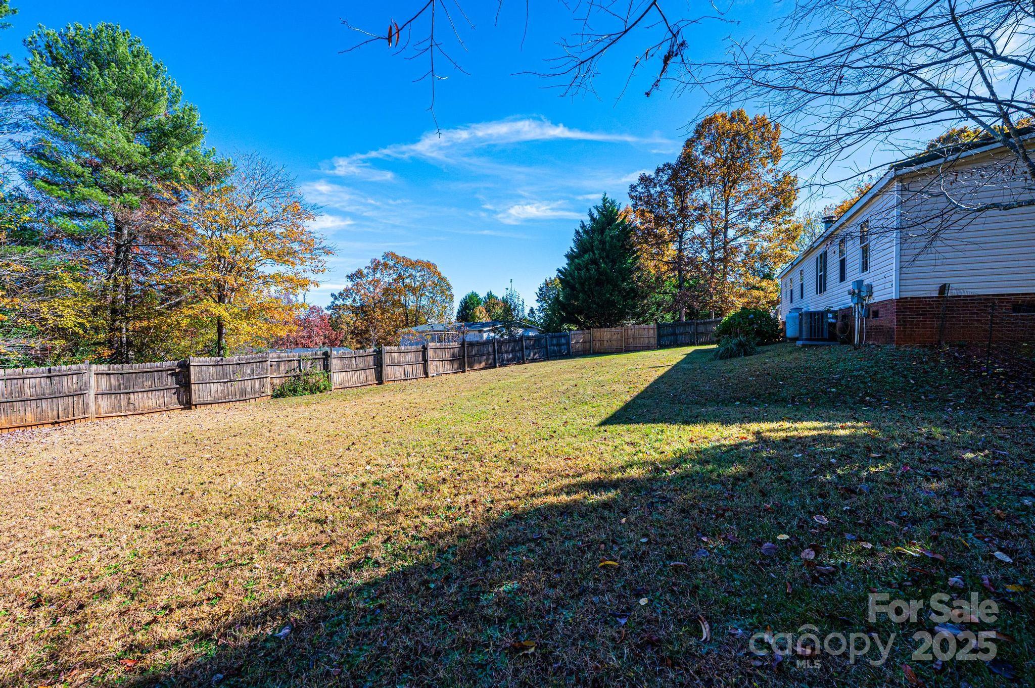 4086 Beckys Drive Lenoir, NC 28645 - Photo 18 of 23 a view of yard with swimming pool and trees