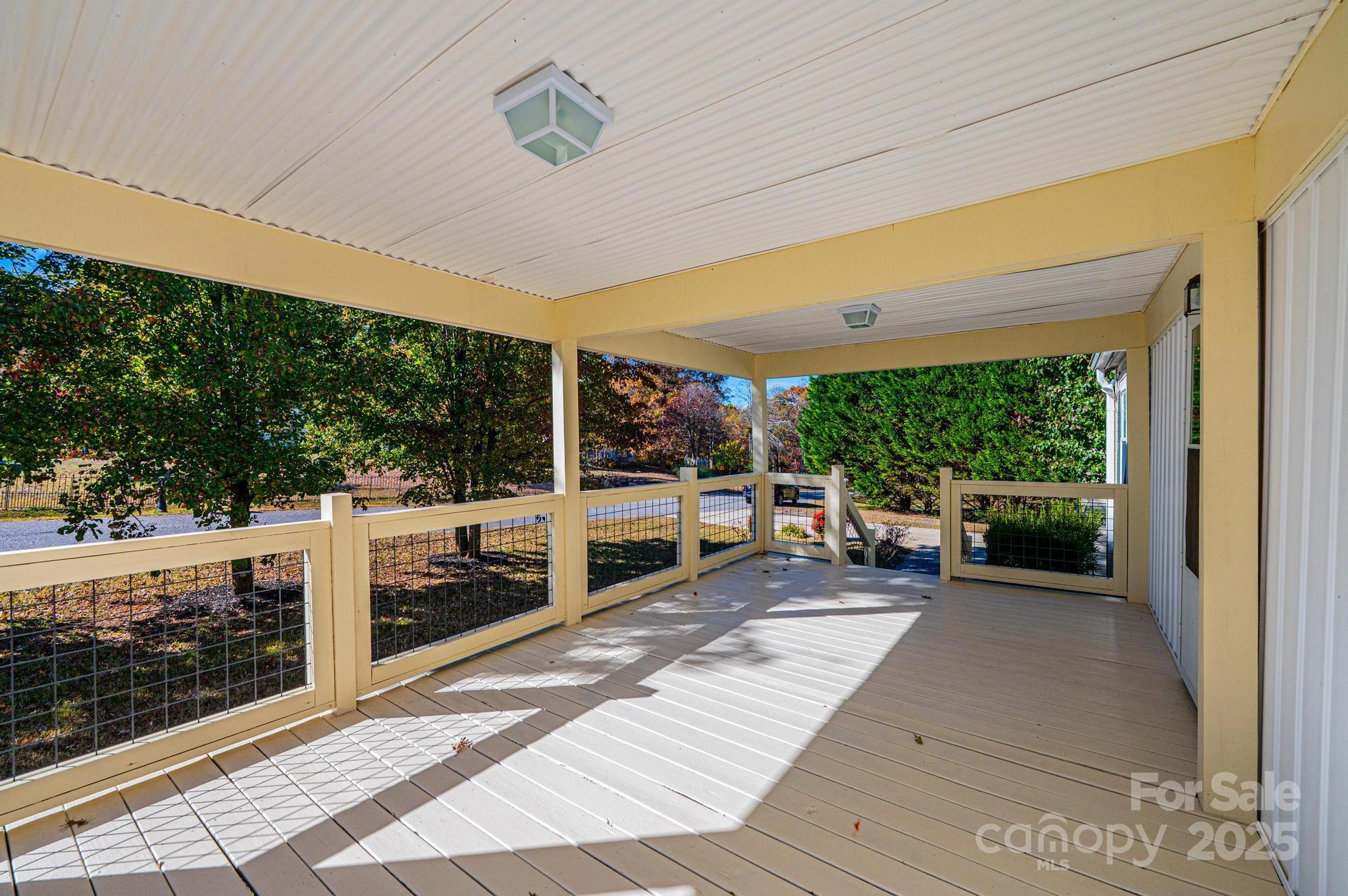 4086 Beckys Drive Lenoir, NC 28645 - Photo 3 of 23 a view of a porch with furniture and a yard
