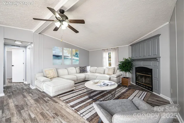 a bathroom with a double vanity sink mirror and bathtub
