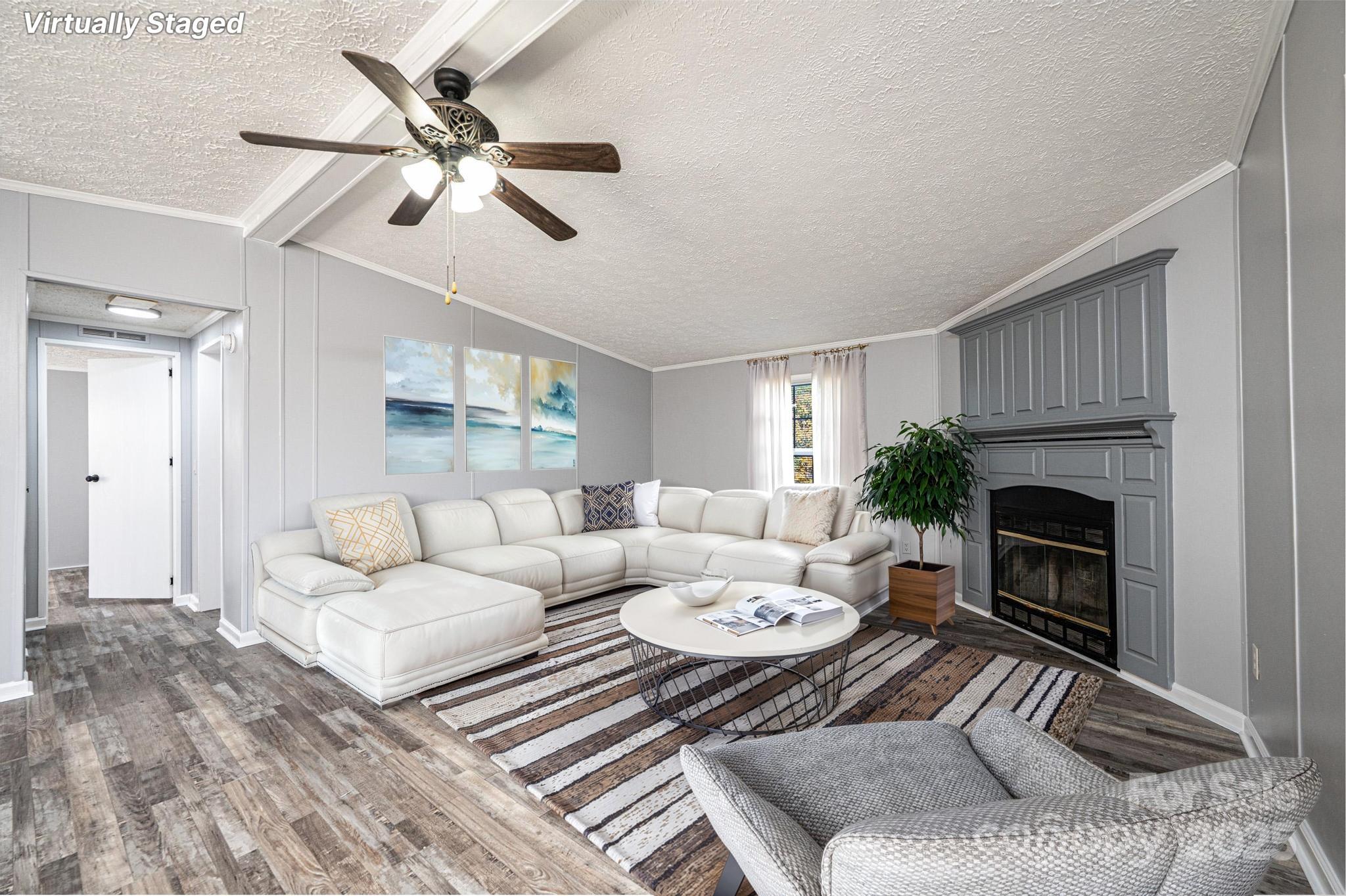 4086 Beckys Drive Lenoir, NC 28645 - Photo 5 of 23 a living room with furniture and a fireplace