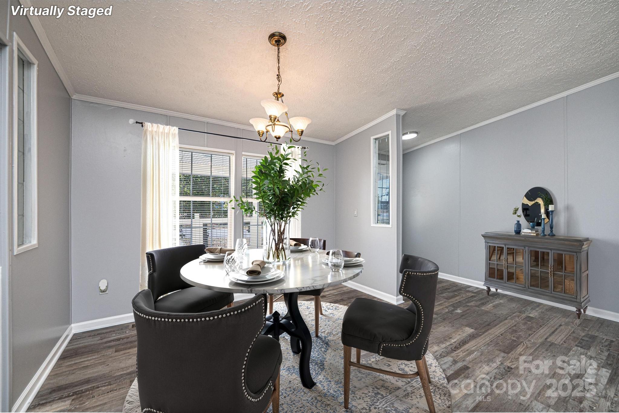 4086 Beckys Drive Lenoir, NC 28645 - Photo 7 of 23 a view of a dining room with furniture and chandelier