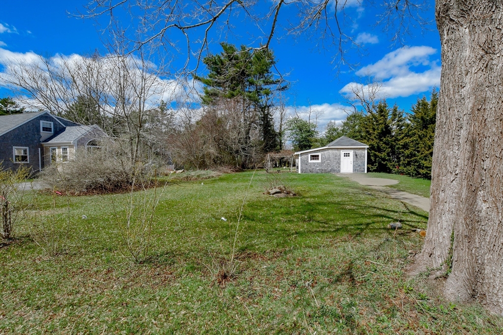 586 B Front Street Marion, MA 02738 - Photo 5 of 10 a view of a house with a yard