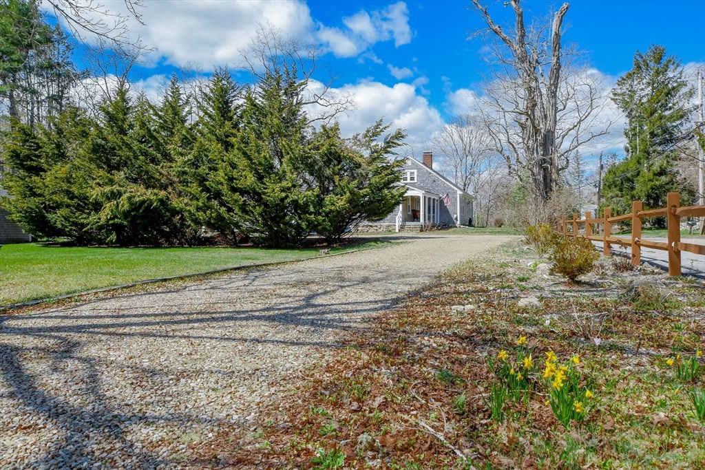 586 B Front Street Marion, MA 02738 - Photo 7 of 10 a view of a yard with a house