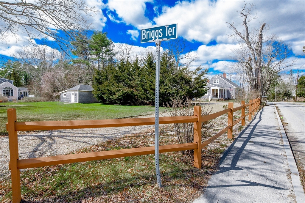 586 B Front Street Marion, MA 02738 - Photo 10 of 10 a view of a house with a yard