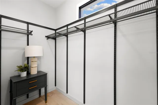 an aerial view of a house with a garden and outdoor space