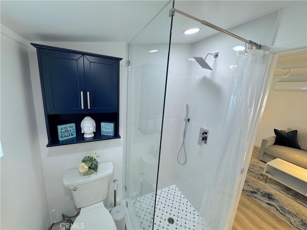 726 1/2 Esplanade Redondo Beach, CA 90277 - Photo 15 of 26 a bathroom with a toilet a sink and shower