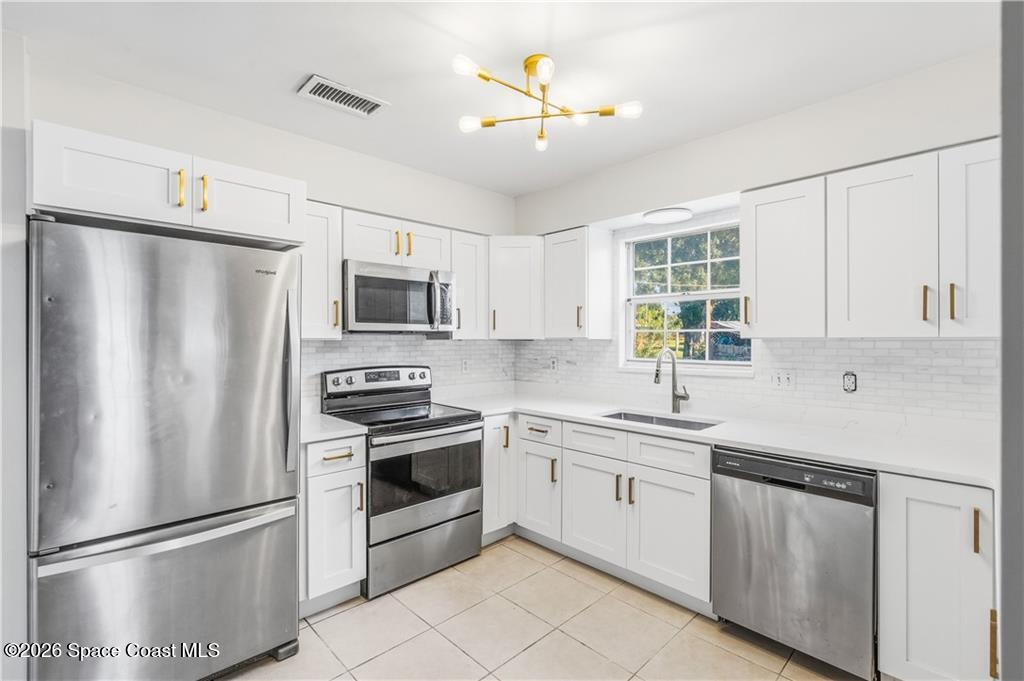 1081 Sunswept Road Northeast Palm Bay, FL 32905 - Photo 6 of 37 6