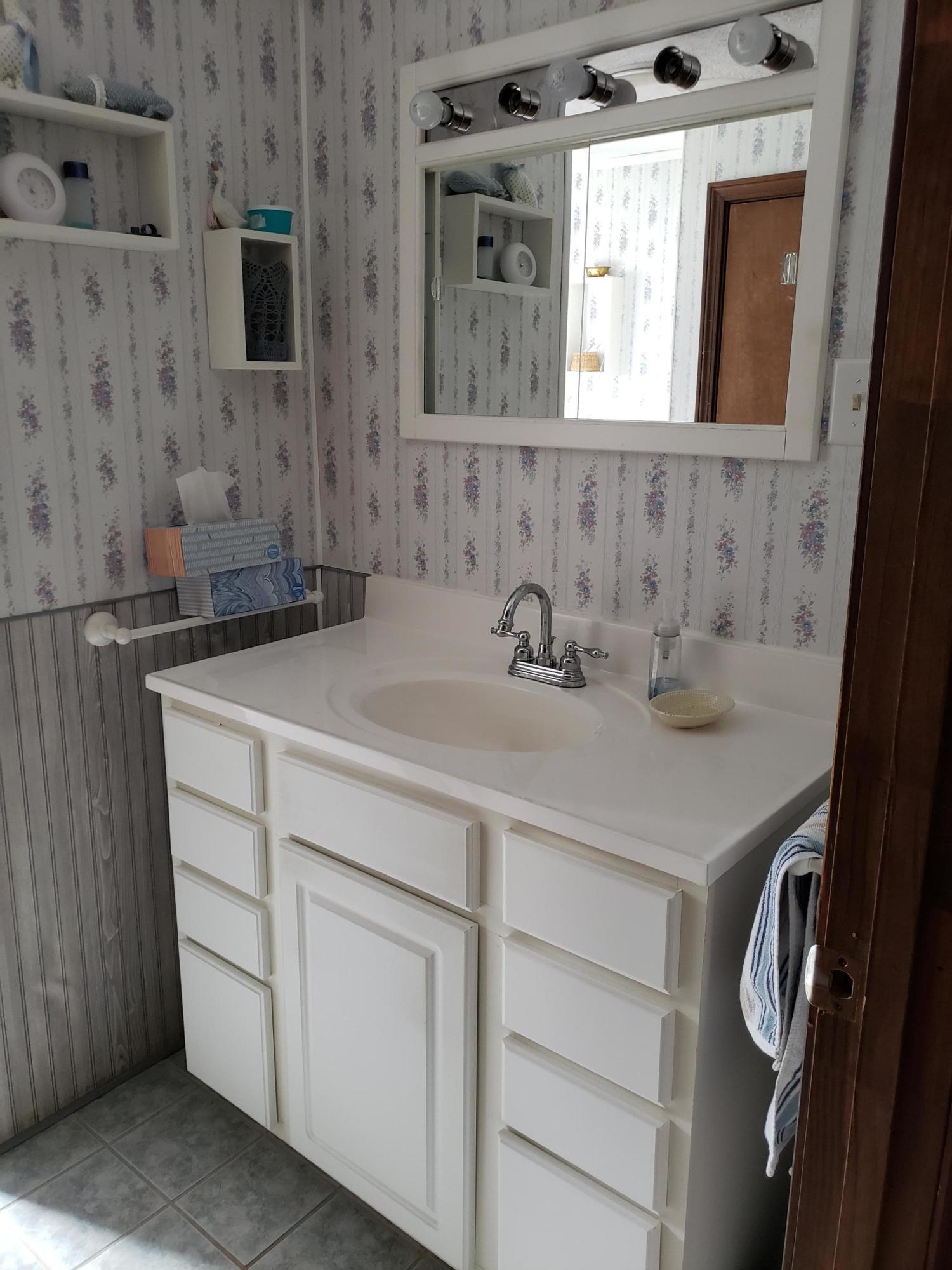 13 White's Corner Road Livermore, ME 04253 - Photo 16 of 28 Newly remodeled bath w/ laundry.