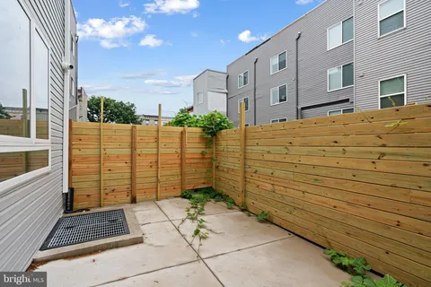 a view of a brick wall of the building