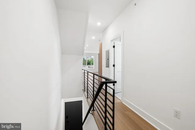 a bathroom with a sink toilet a mirror and shower