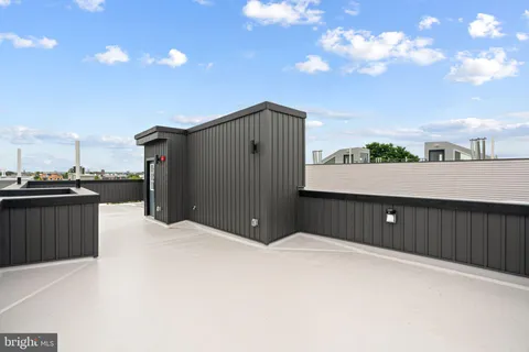 a view of balcony with furniture