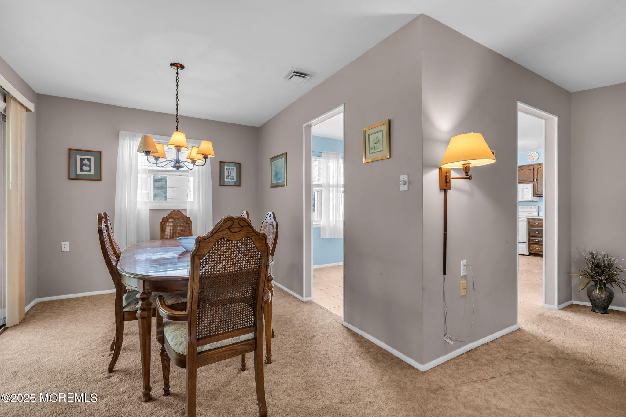 67 Blake Circle Brick, NJ 08724 - Photo 13 of 34 a dining room with furniture and window