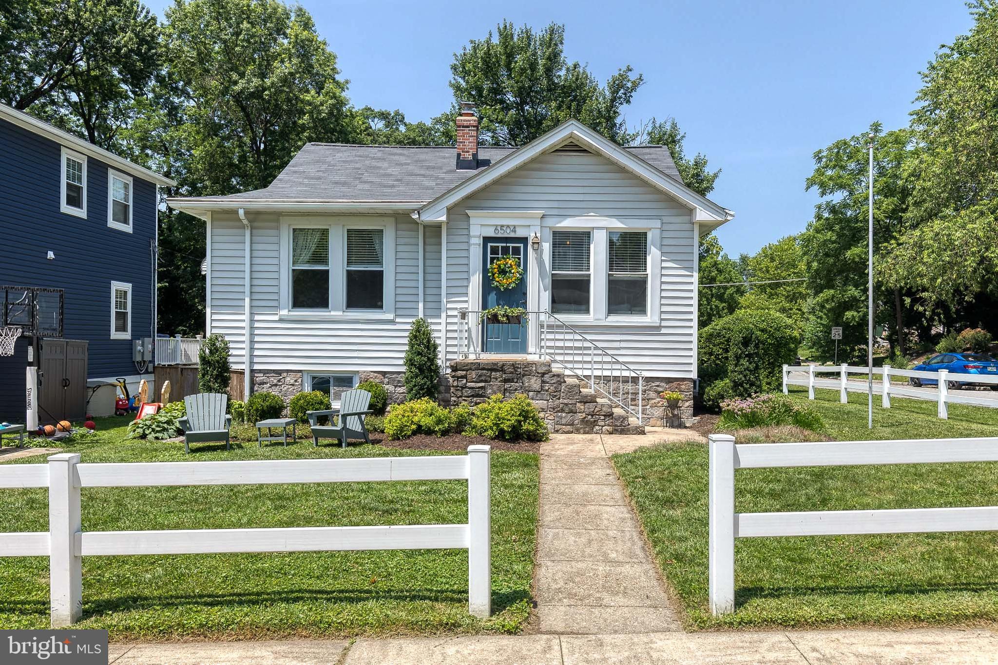 6504 Maplewood Road Baltimore, MD 21212 - Photo 1 of 45 a front view of a house with a yard