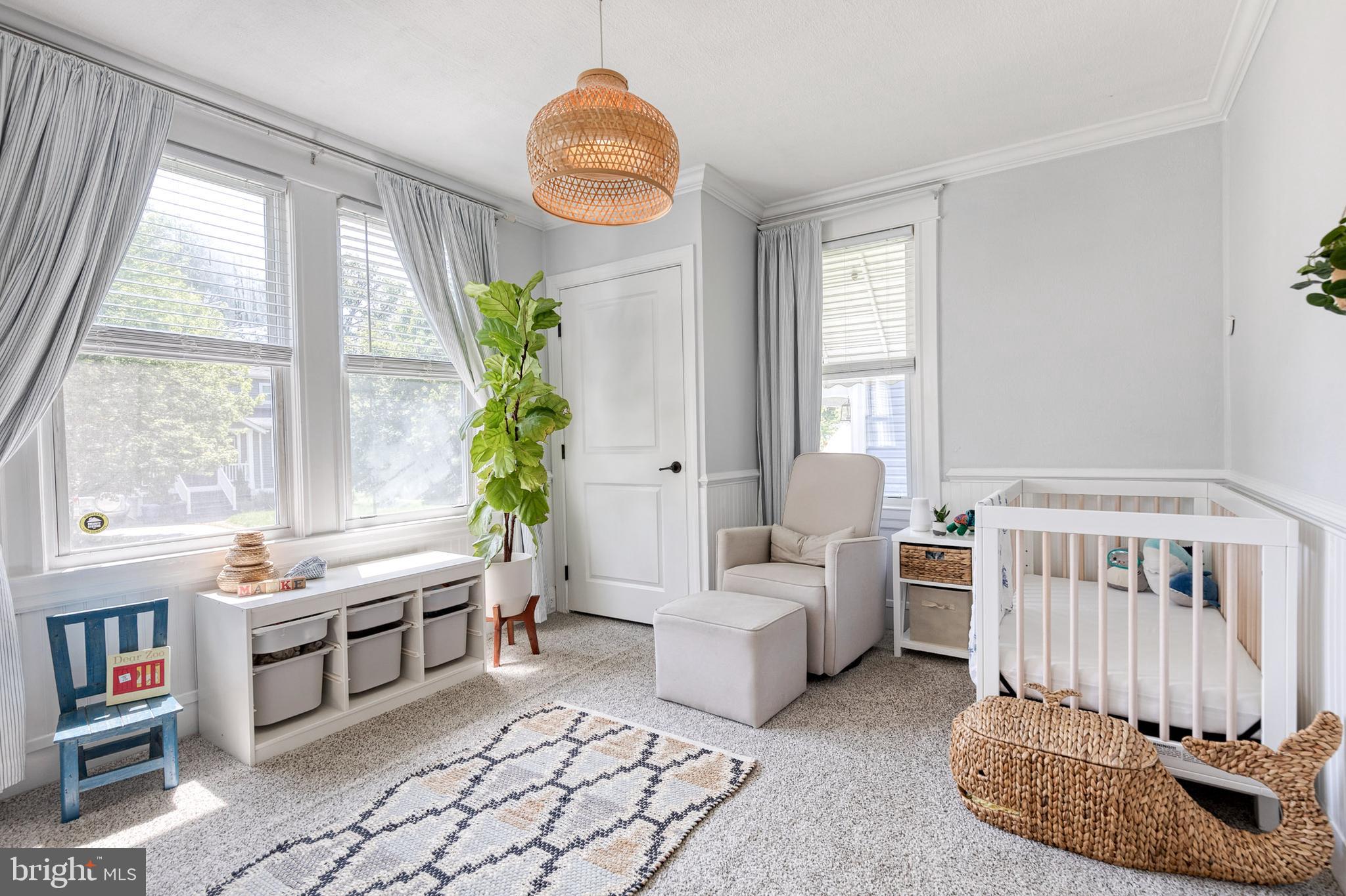6504 Maplewood Road Baltimore, MD 21212 - Photo 17 of 45 a living room with furniture and a window