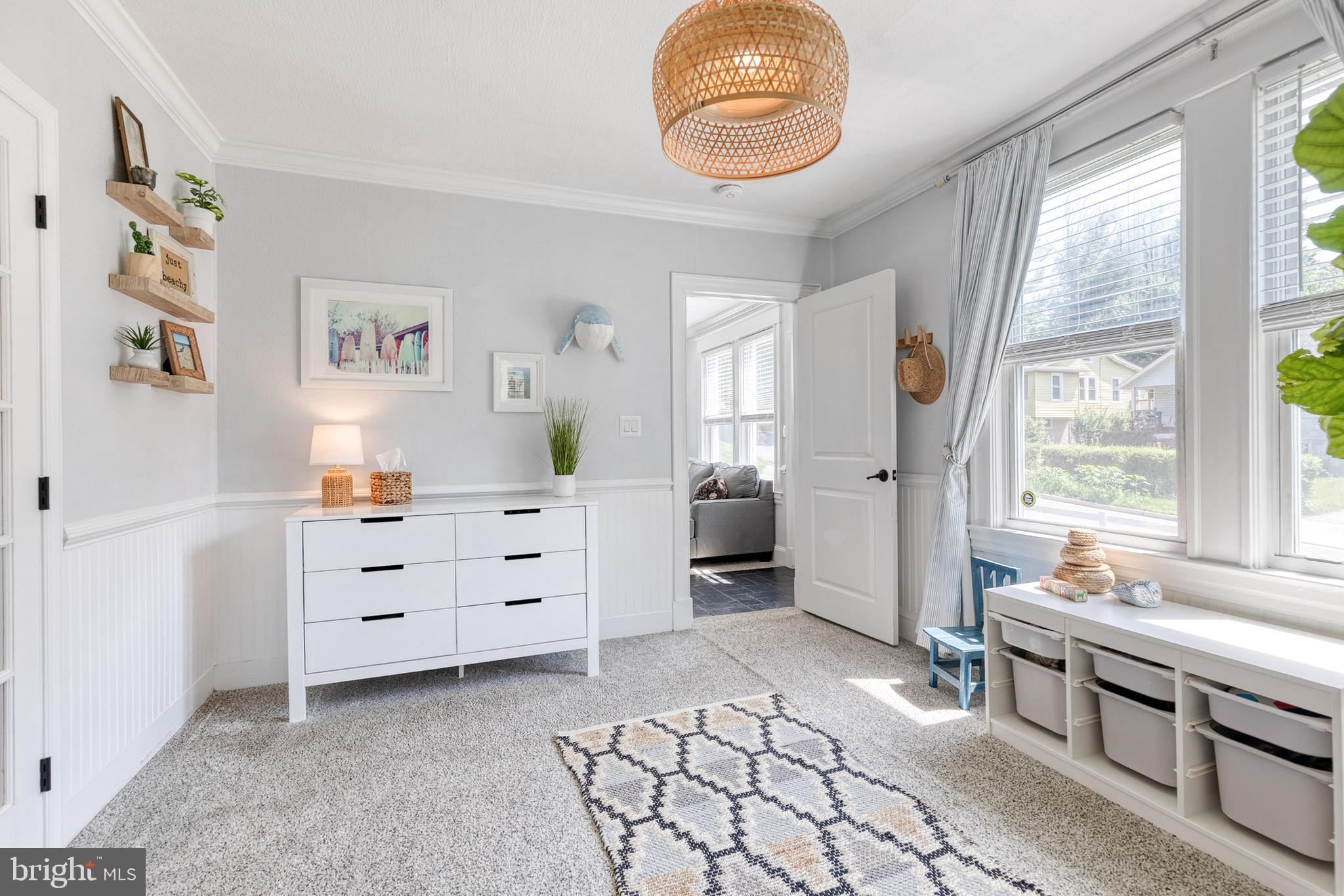 6504 Maplewood Road Baltimore, MD 21212 - Photo 18 of 45 a room with furniture and a window