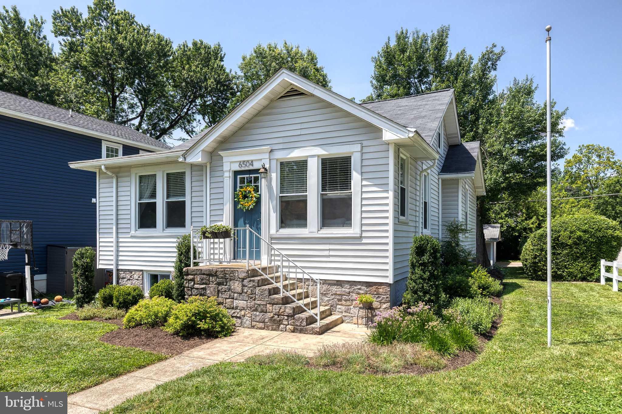 6504 Maplewood Road Baltimore, MD 21212 - Photo 2 of 45 a front view of a house with a yard