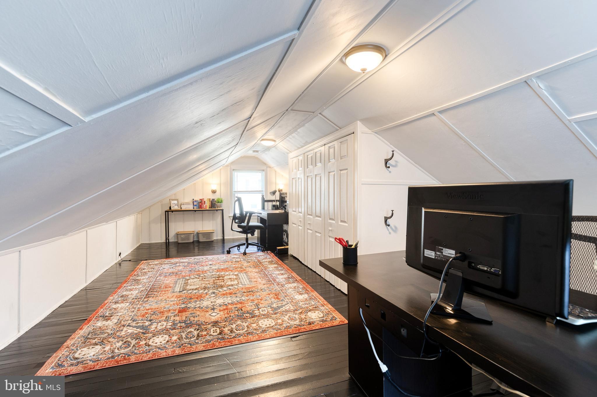 6504 Maplewood Road Baltimore, MD 21212 - Photo 25 of 45 a room with table chairs and mirrors