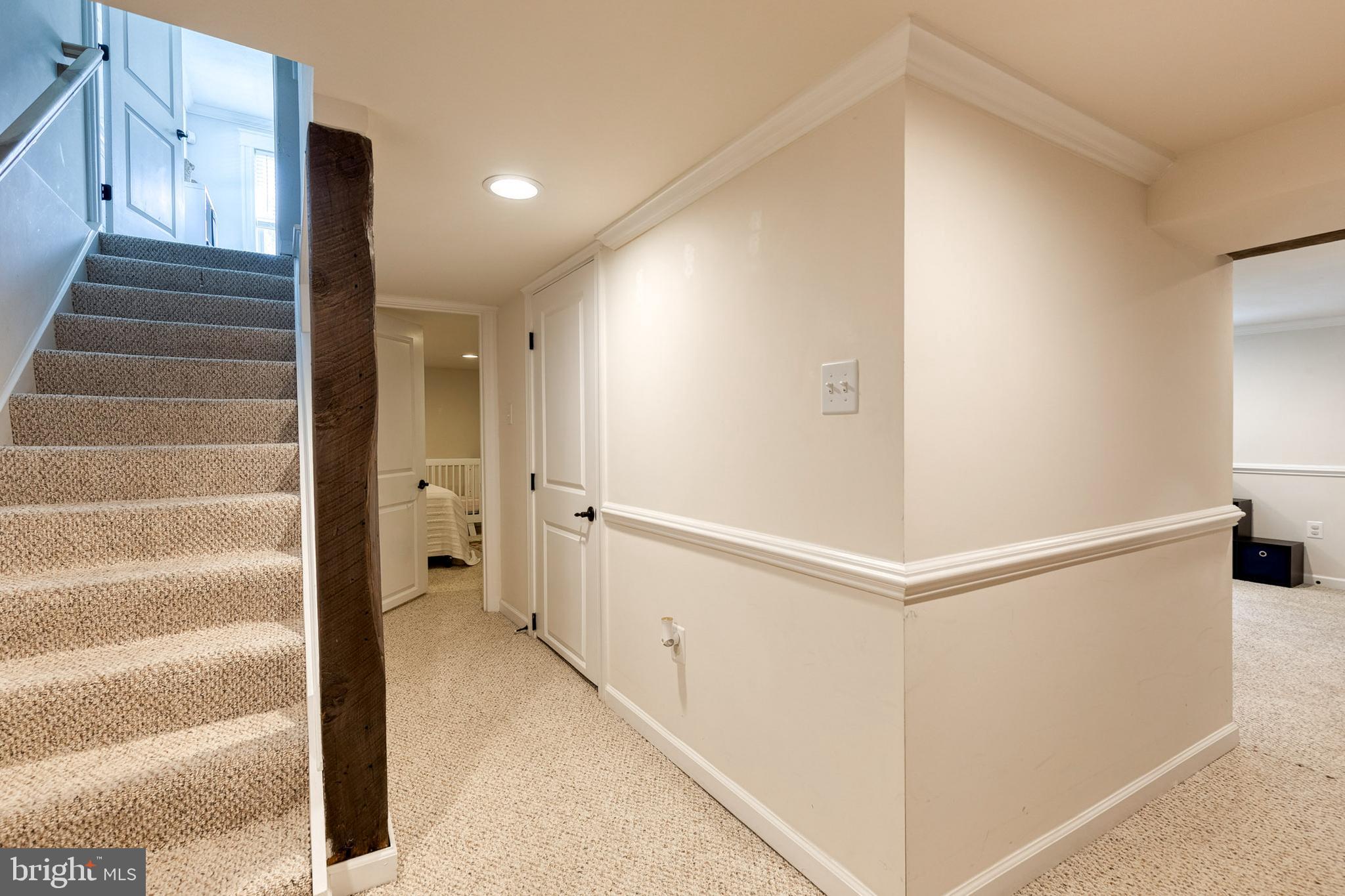 6504 Maplewood Road Baltimore, MD 21212 - Photo 30 of 45 a view of an entryway with staircase