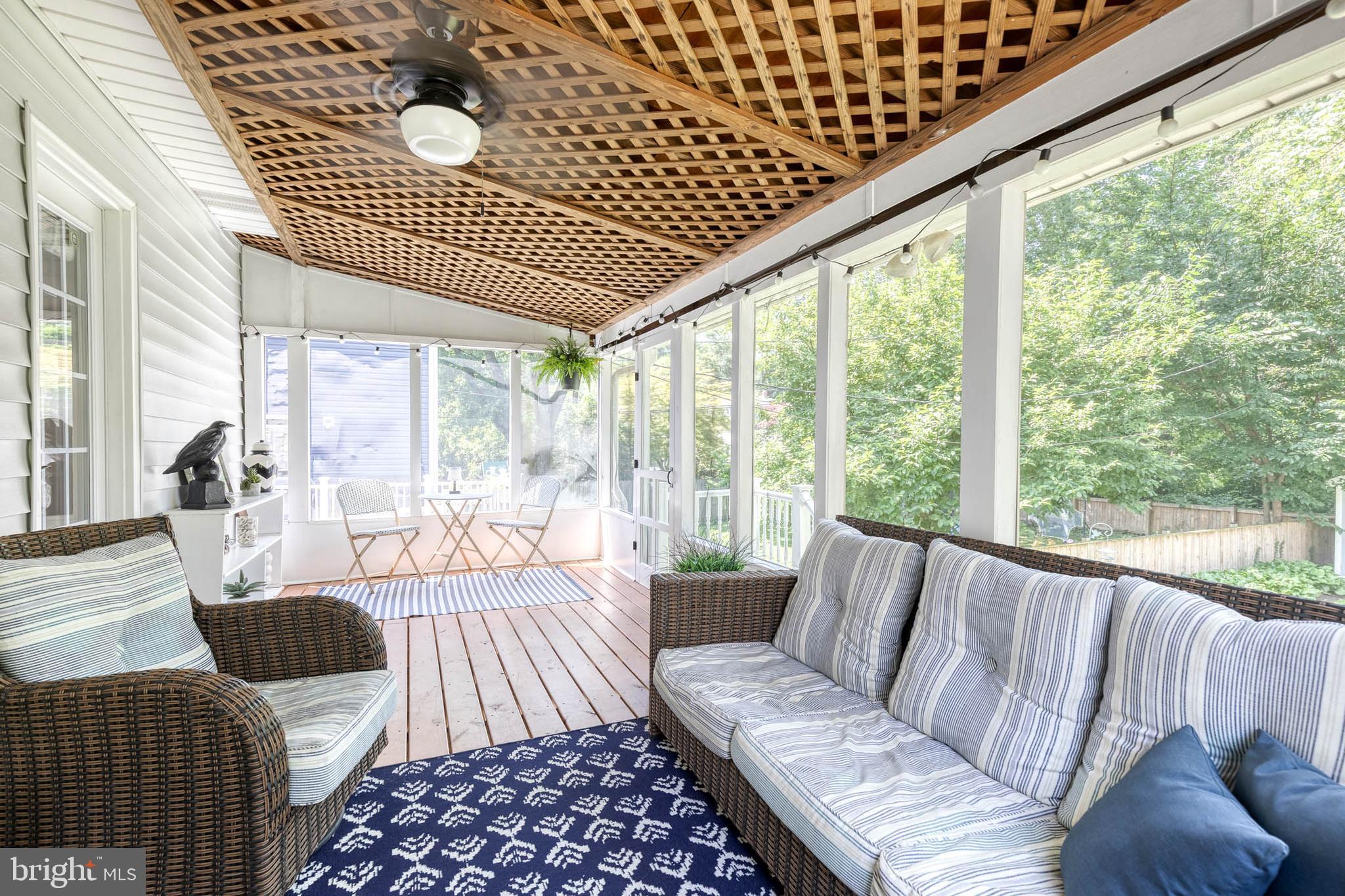 6504 Maplewood Road Baltimore, MD 21212 - Photo 33 of 45 a living room with furniture and a large window
