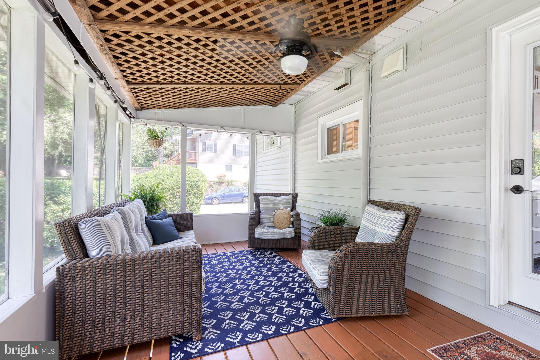 6504 Maplewood Road Baltimore, MD 21212 - Photo 35 of 45 a living room with furniture and a window
