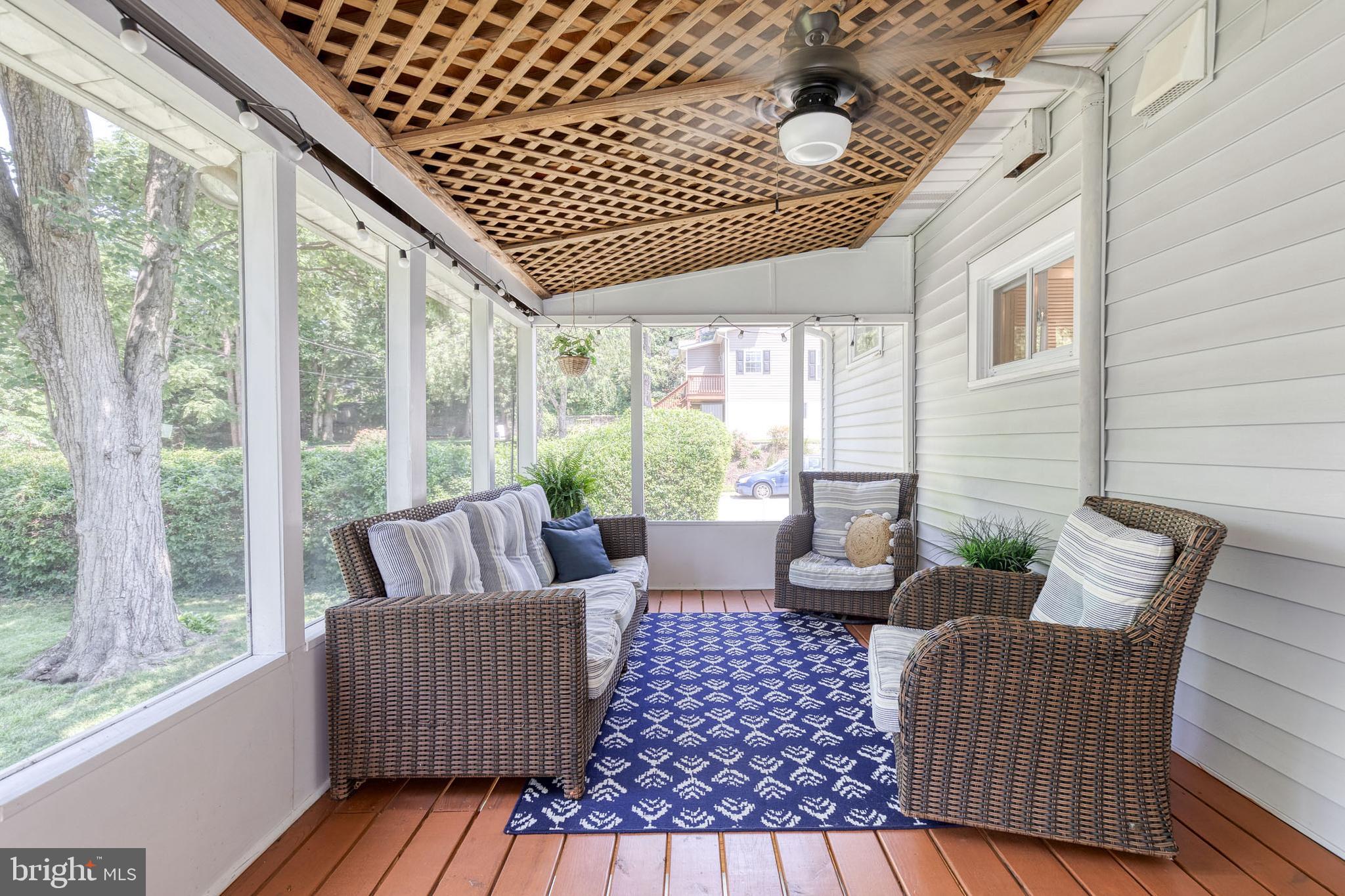 6504 Maplewood Road Baltimore, MD 21212 - Photo 36 of 45 a living room with furniture and a large window