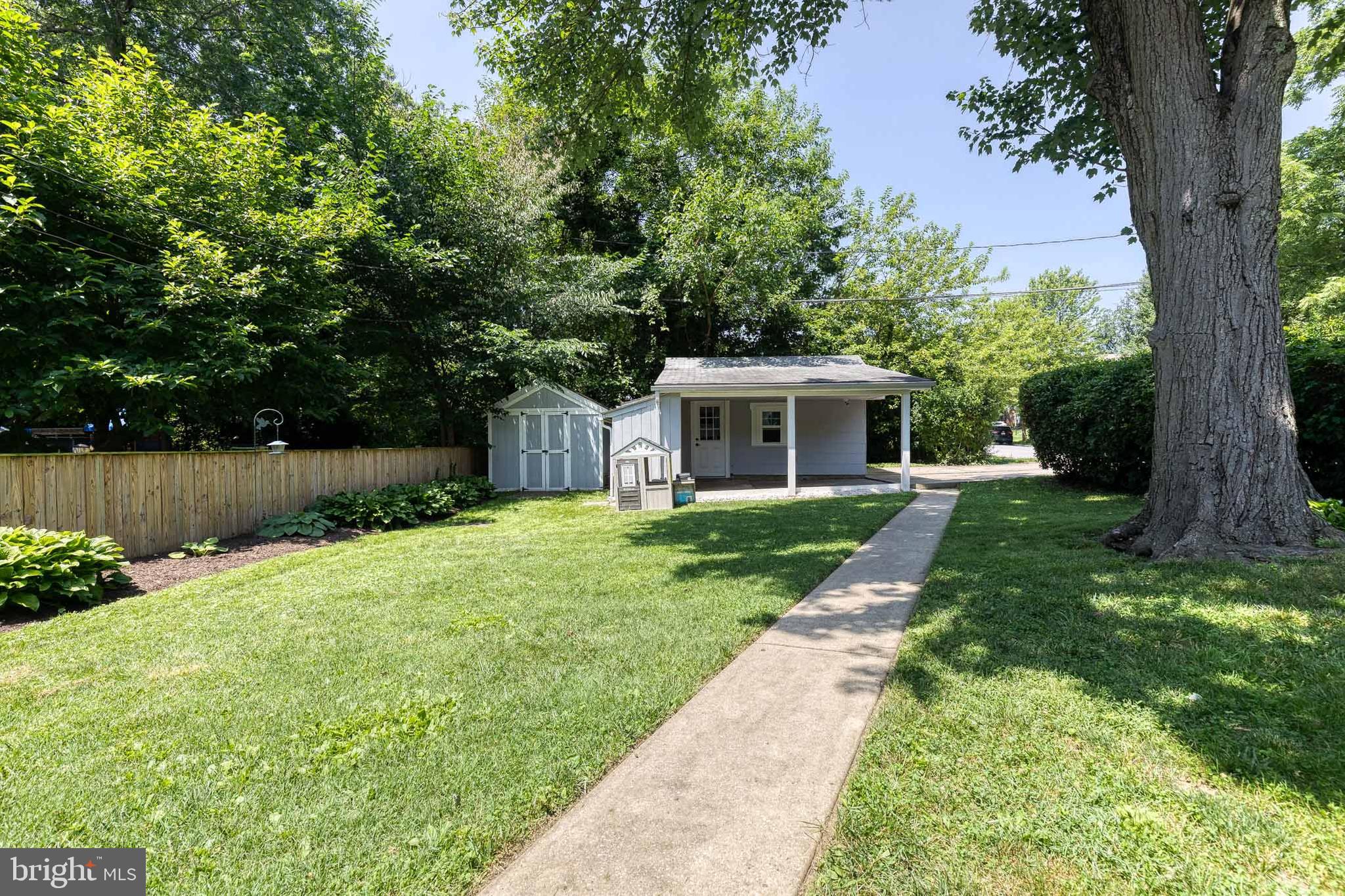 6504 Maplewood Road Baltimore, MD 21212 - Photo 37 of 45 a front view of a house with garden