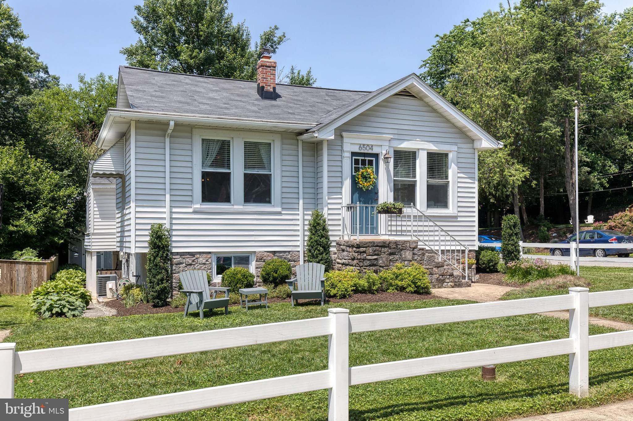 6504 Maplewood Road Baltimore, MD 21212 - Photo 43 of 45 a front view of a house with a yard