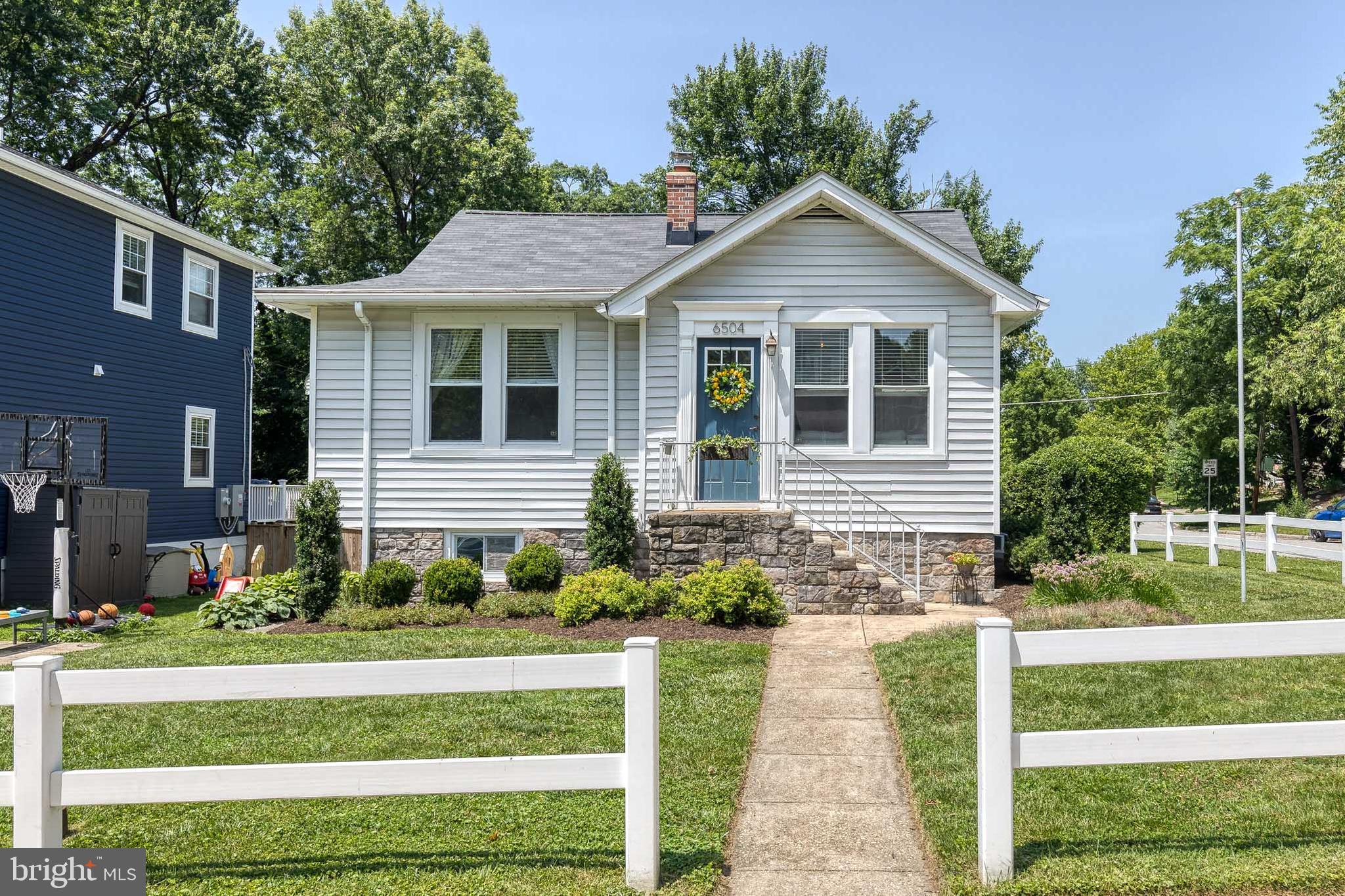 6504 Maplewood Road Baltimore, MD 21212 - Photo 44 of 45 a front view of a house with a yard