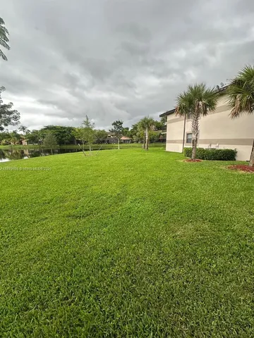a view of outdoor space and yard