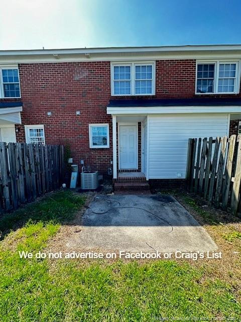 6473 Yadkin Road, Unit 23 Fayetteville, NC 28303 - Photo 8 of 8 a front view of a house with garden