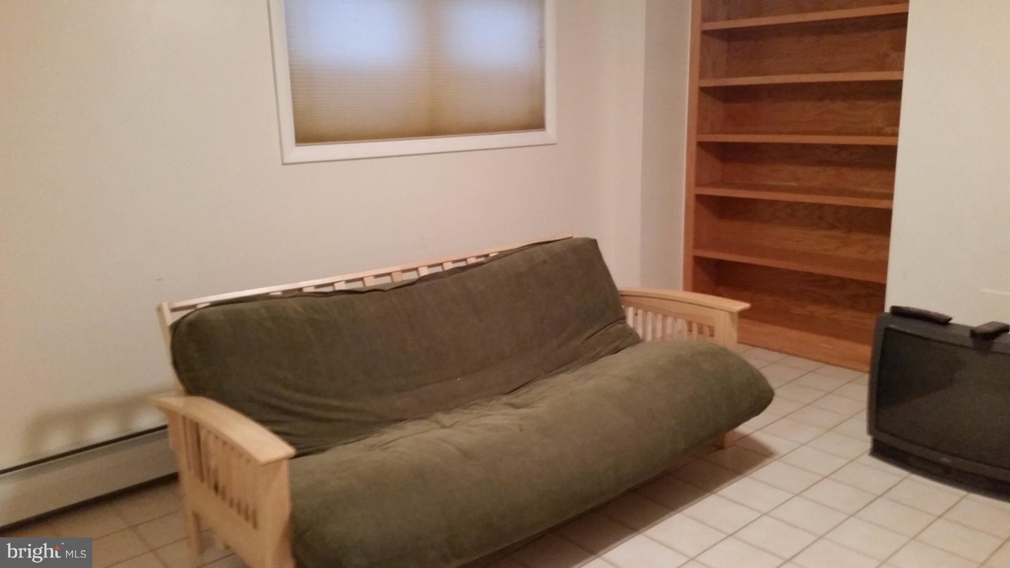 10609 Gorman Road Laurel, MD 20723 - Photo 19 of 28 L/L den with bookshelves)