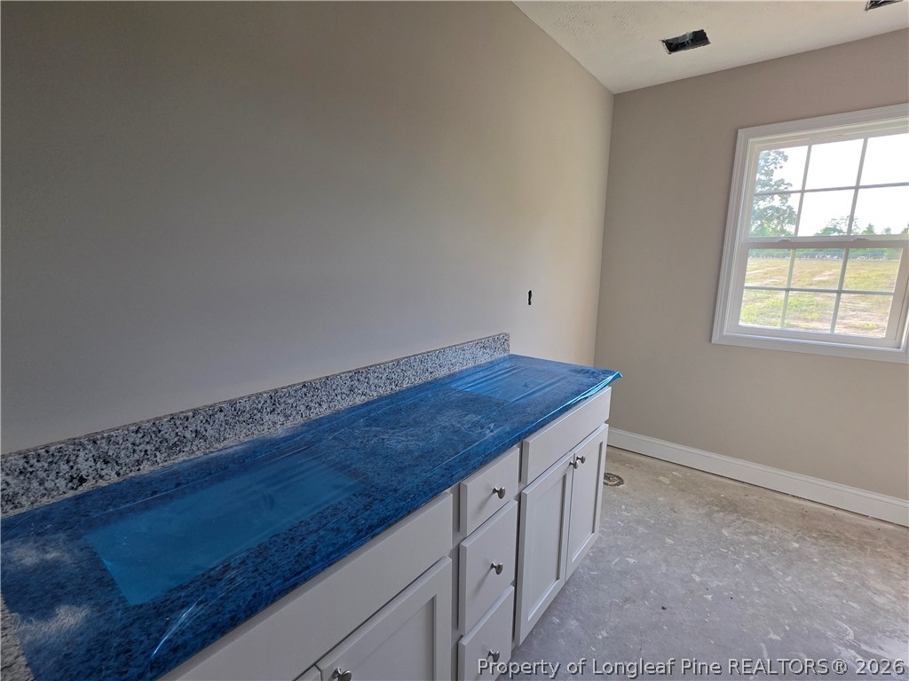 756 Jordan Road Autryville, NC 28318 - Photo 26 of 34 wooden floor in an empty room with a window