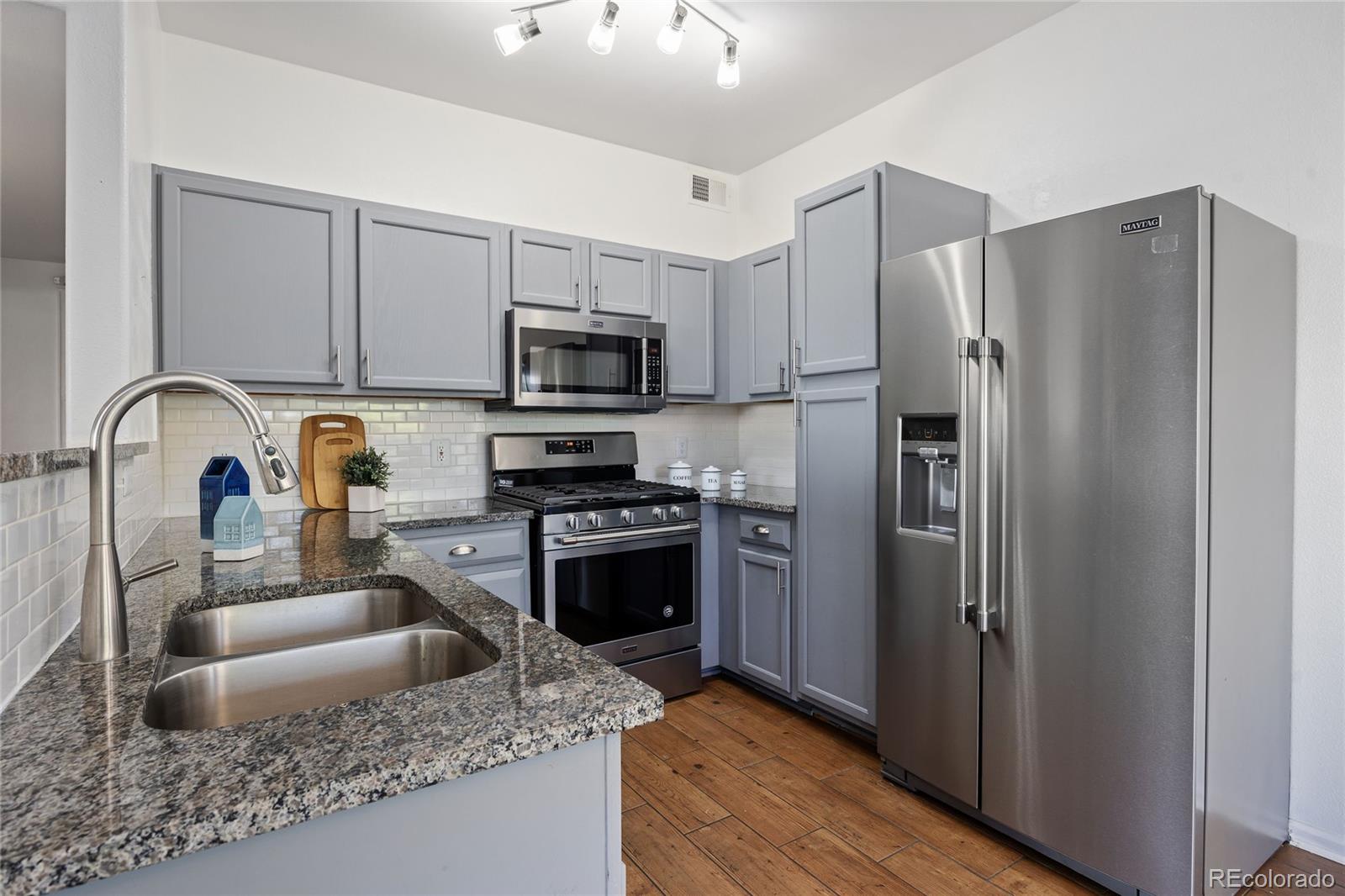 8405 Pebble Creek Way, Unit 104 Highlands Ranch, CO 80126 - Photo 13 of 40