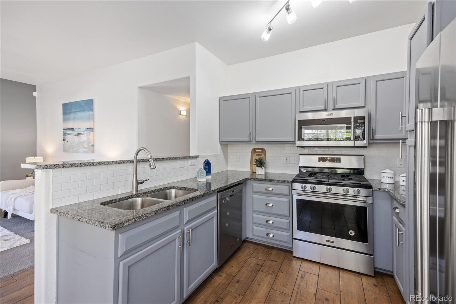 8405 Pebble Creek Way, Unit 104 Highlands Ranch, CO 80126 - Photo 14 of 40