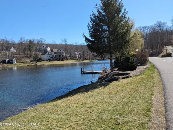 a view of a lake with a house