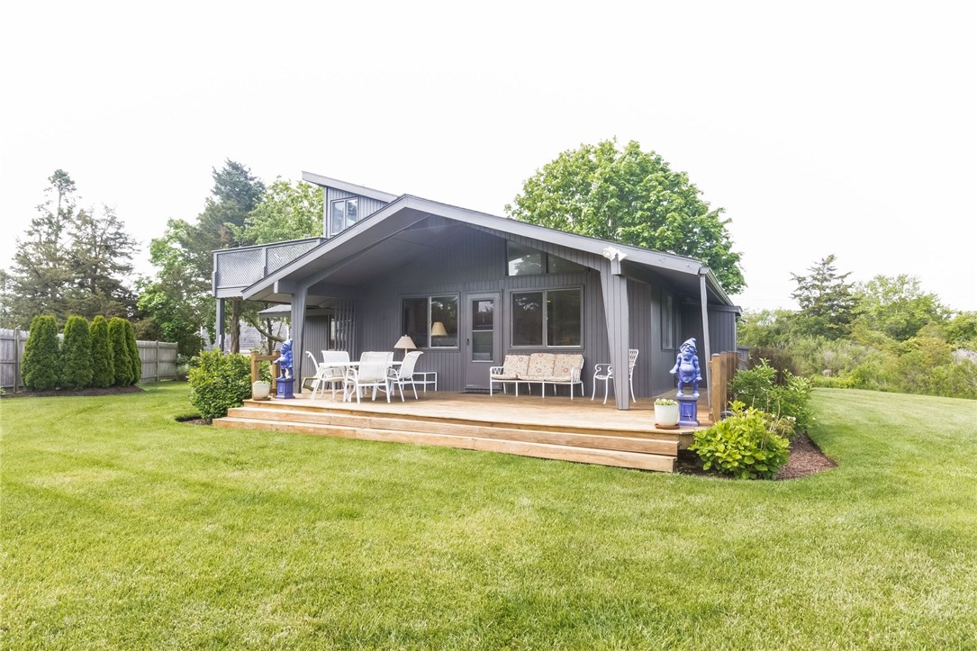 4 Shell Drive Westerly, RI 02891 - Photo 14 of 35 A beautiful lawn to practice your 9 iron on!