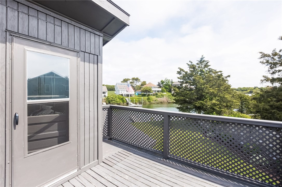 4 Shell Drive Westerly, RI 02891 - Photo 31 of 35 Balcony off of second floor bedroom - if you look south you can see the ocean!
